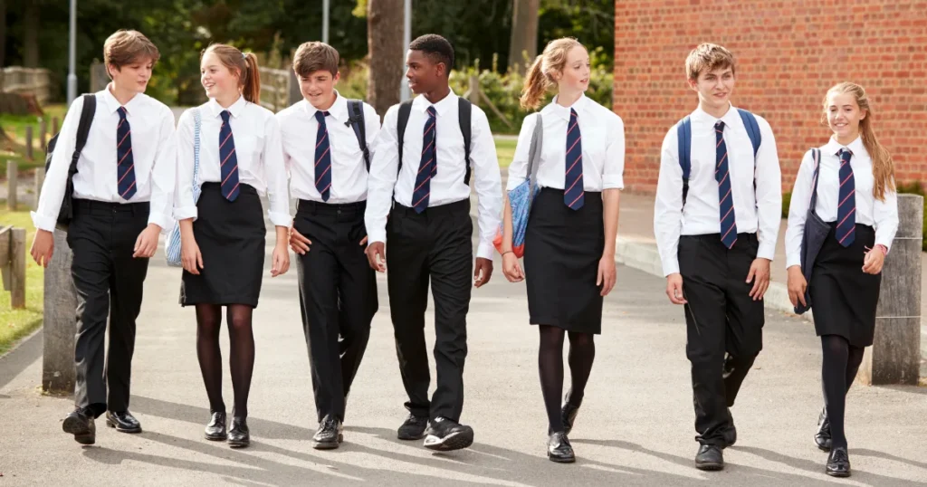 Students walking in the school and wearing Custom School Uniforms