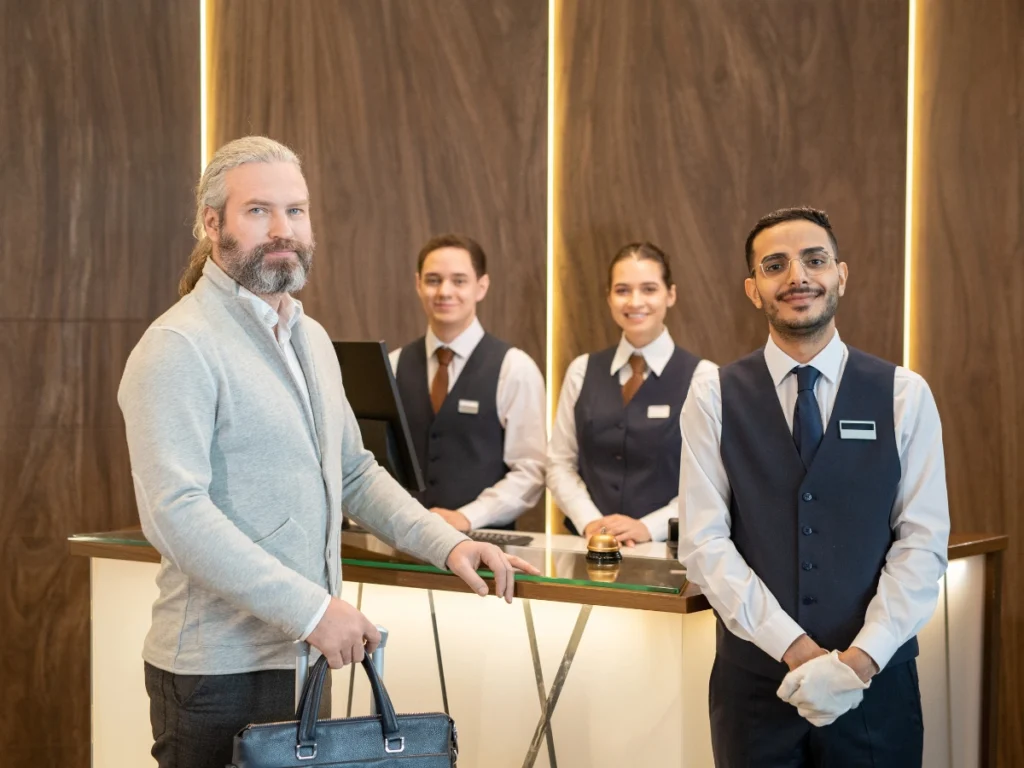 Busy hotel reception area with staff and guests during Ramadan 2026 UAE Business Preparation for service excellence